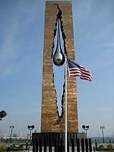 The teardrop within the tower, beside the American flag